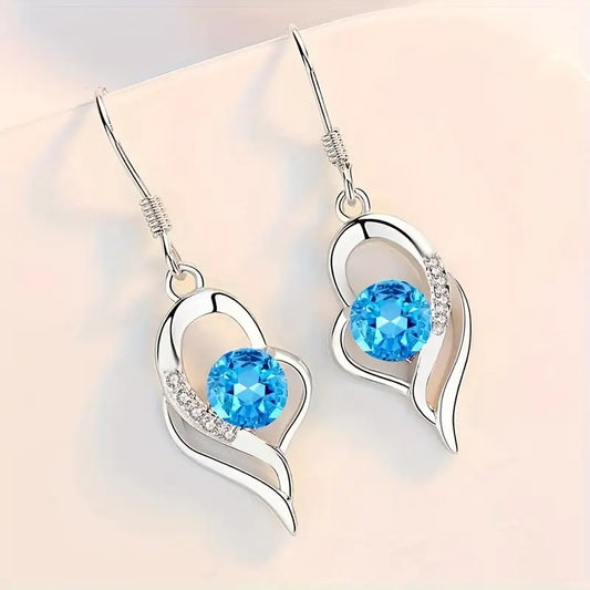 The Sapphire Eclipse Heart Earrings