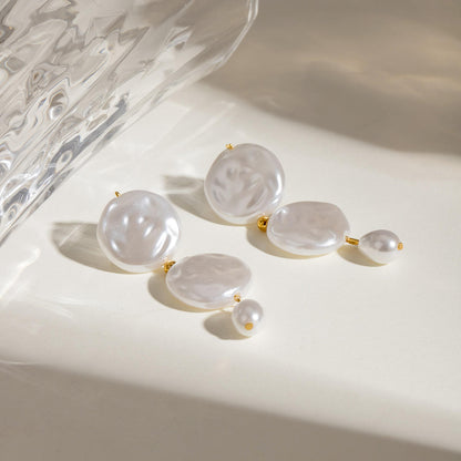 The Modern Tide Pearl Earrings