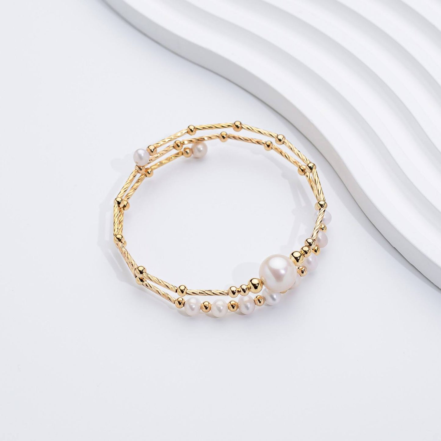 The Luna Glow Pearl Bangle