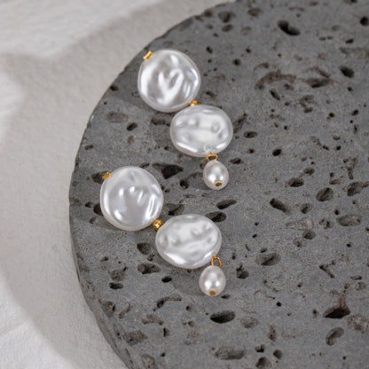 The Modern Tide Pearl Earrings