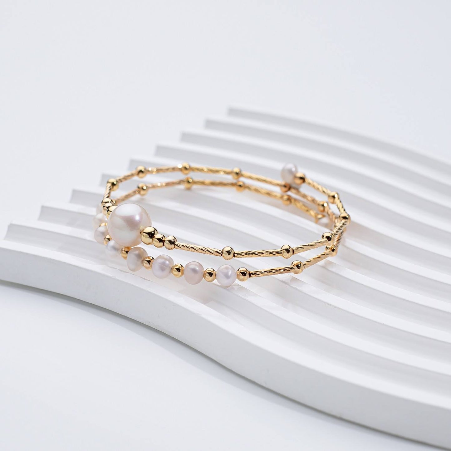 The Luna Glow Pearl Bangle