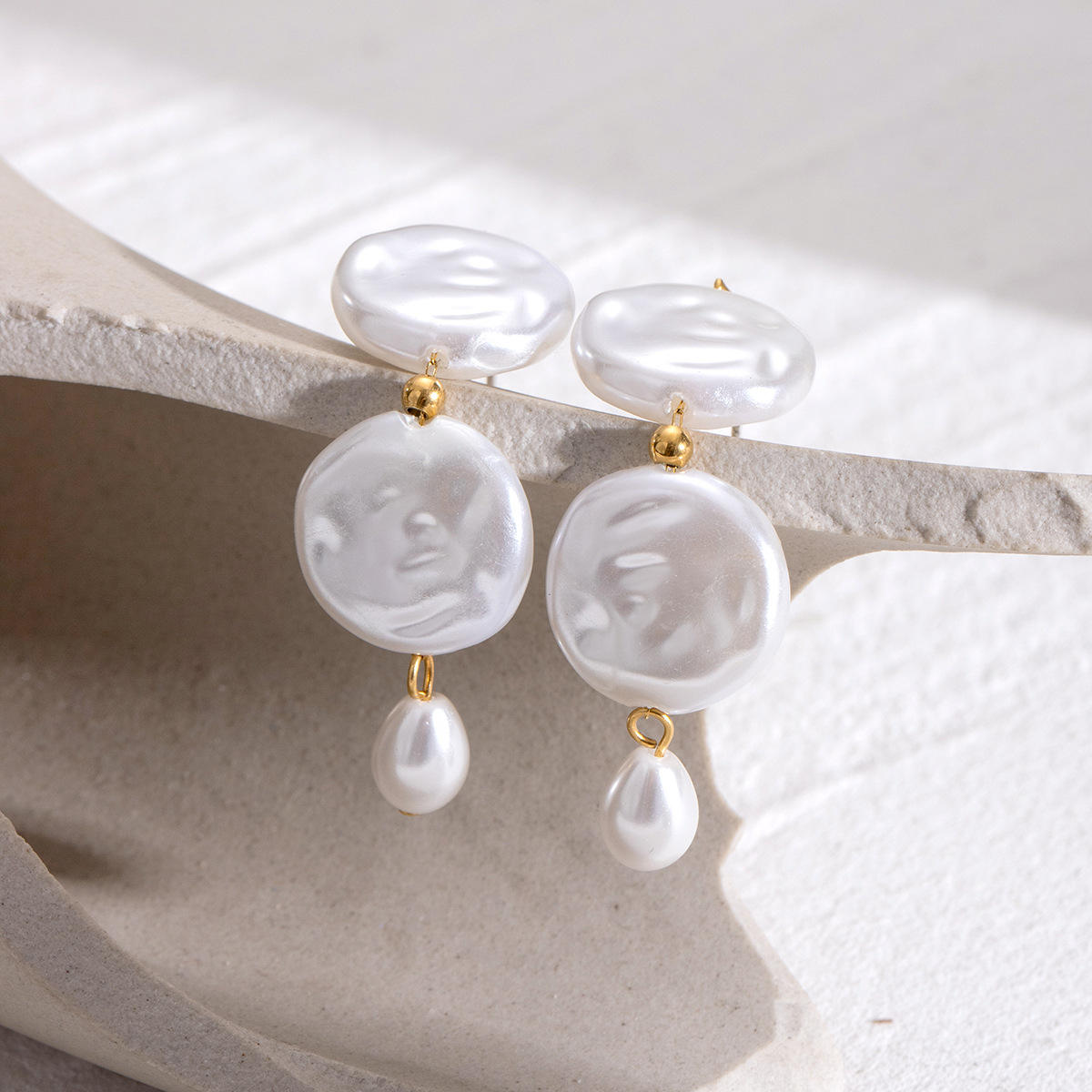 The Modern Tide Pearl Earrings