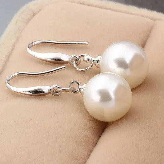 The Celeste Charm Pearl Earrings