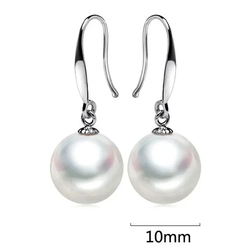 The Celeste Charm Pearl Earrings