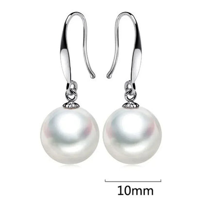 The Celeste Charm Pearl Earrings